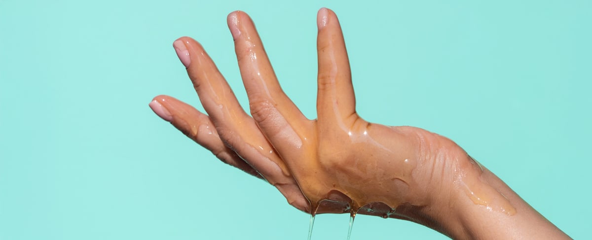 Hand covered in lube