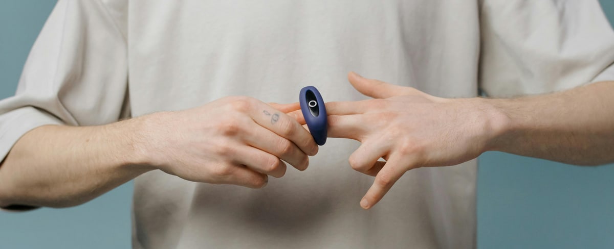 Male using a cock ring