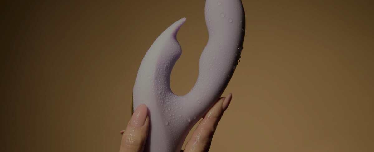 Sex toy on red background